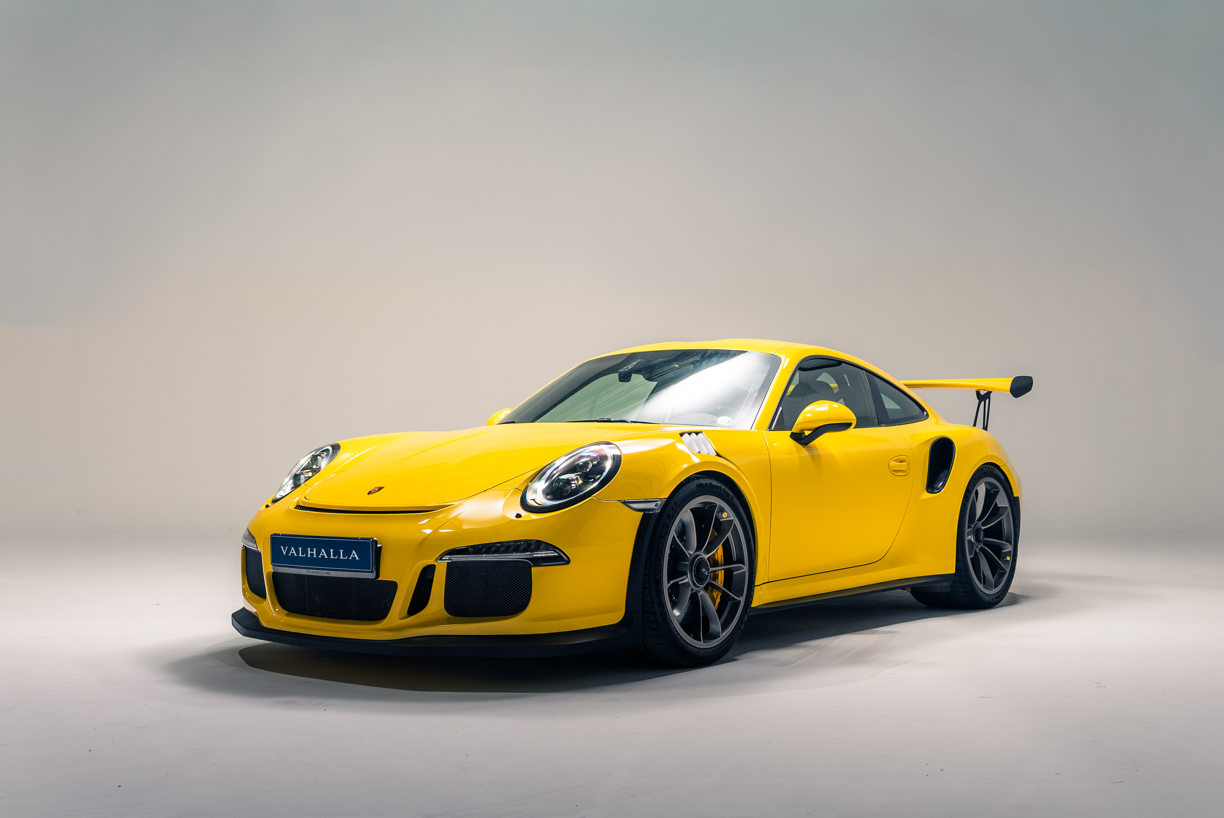 Yellow Porsche front view